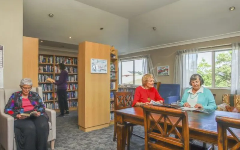 Residents enjoying library